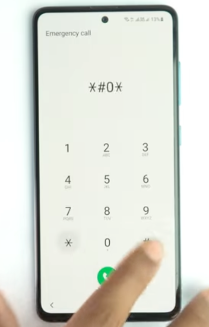 The Samsung test mode screen, accessed by dialing *#0*# on the emergency dialer, used for enabling ADB on older models.