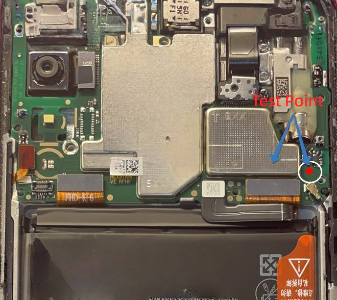 A close-up photo showing the exact location of the STK-LX1 test point